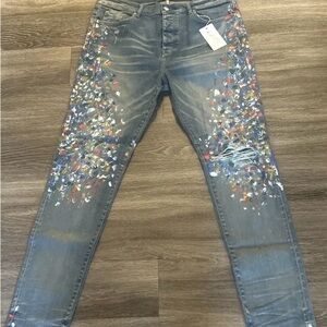 AMIRI Blue Skinny Painter Jeans with Multicolor Splatter